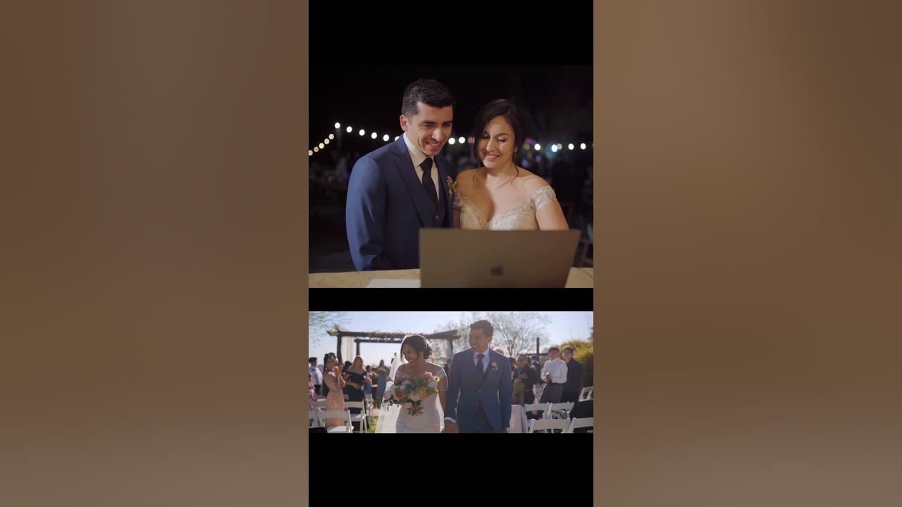 bride and groom watching wedding film on laptop together