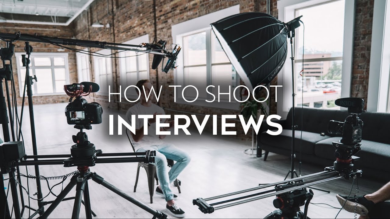 camera crew lighting an interview subject