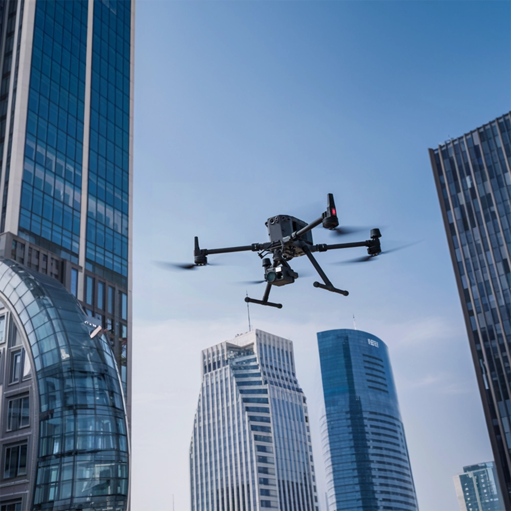 drone filming over modern office building