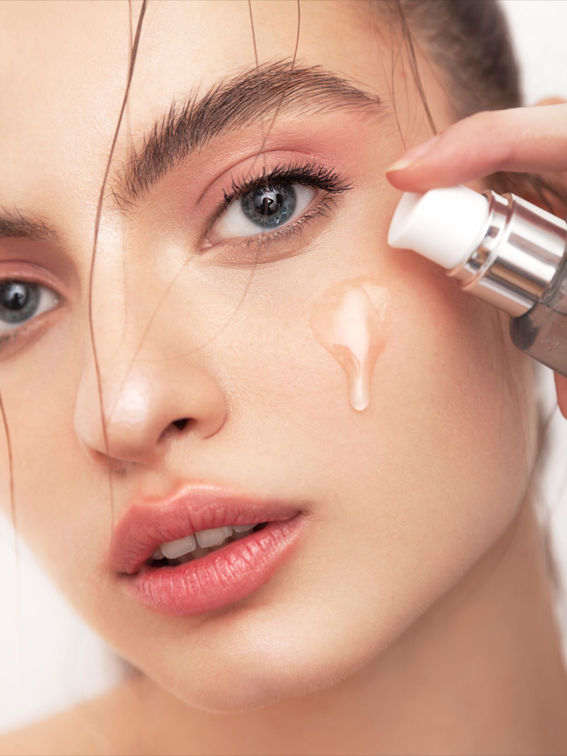 macro lens close up of cosmetic product with dramatic studio lighting and reflections