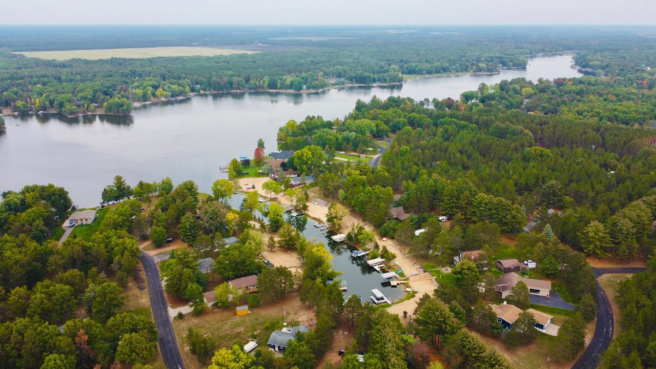 aerial drone shot of lakefront vacation rental dock