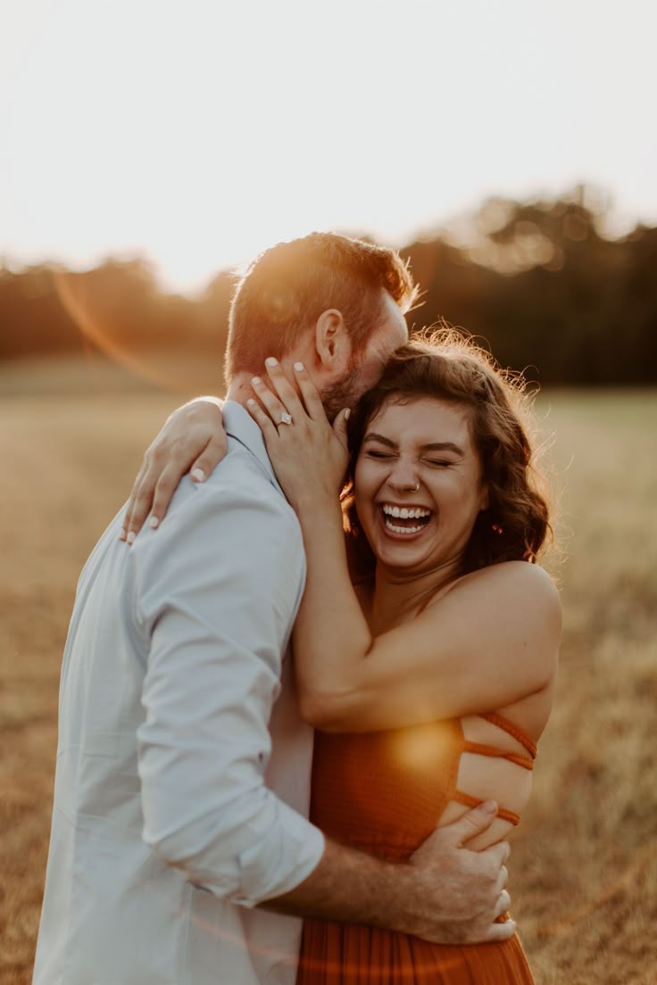 couple filmed during outdoor engagement session golden hour