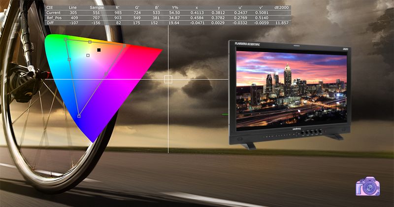 editor color grading documentary footage on monitor