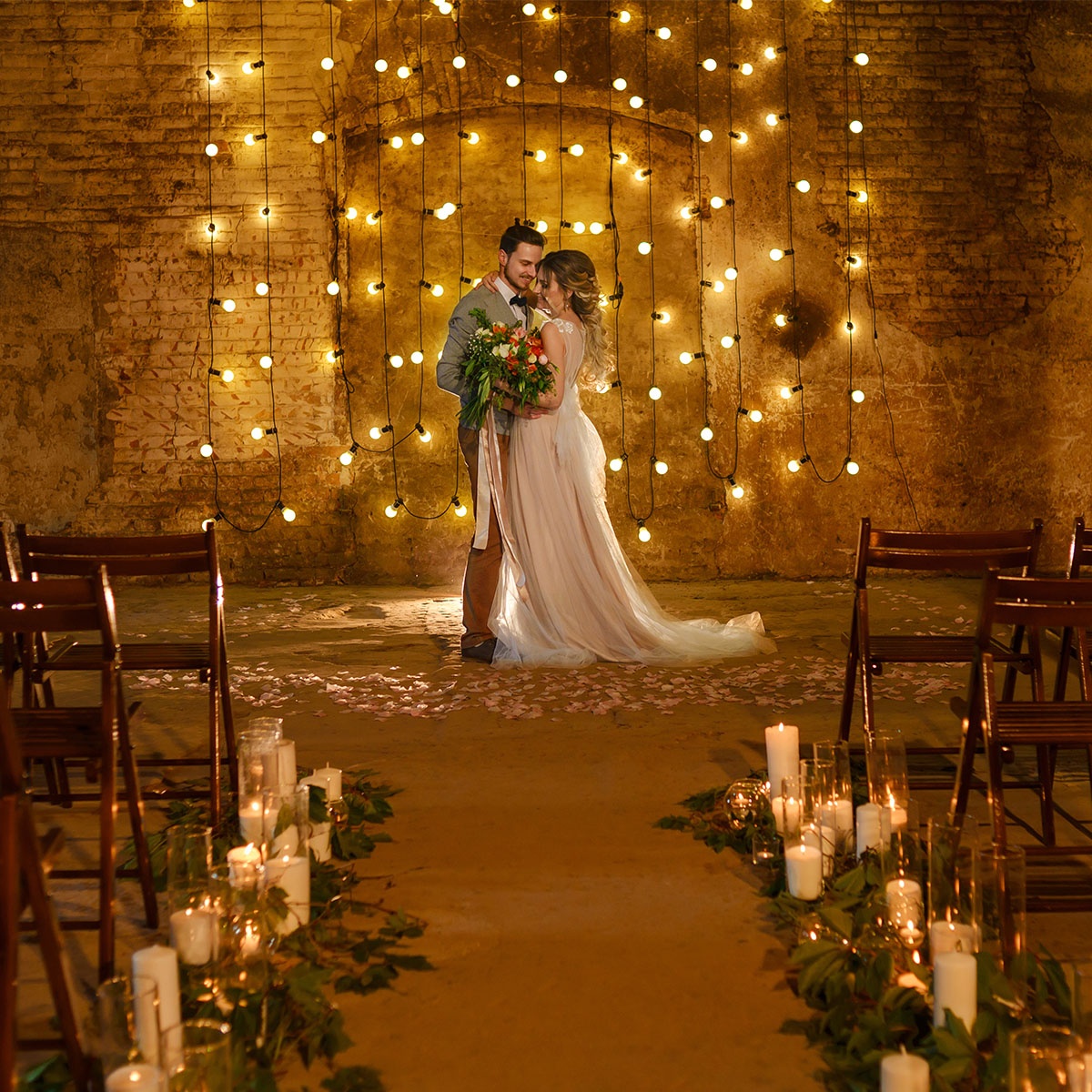 small LED panel light on a stand at a dim wedding reception