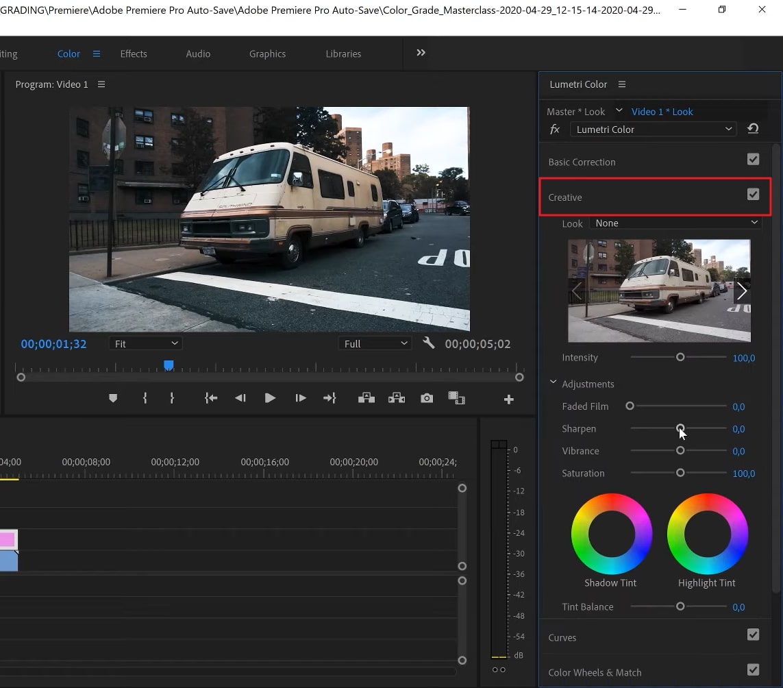 video editor color grading car footage on computer