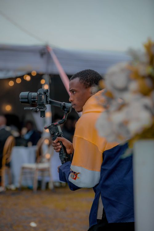 director filming rapper with gimbal at night